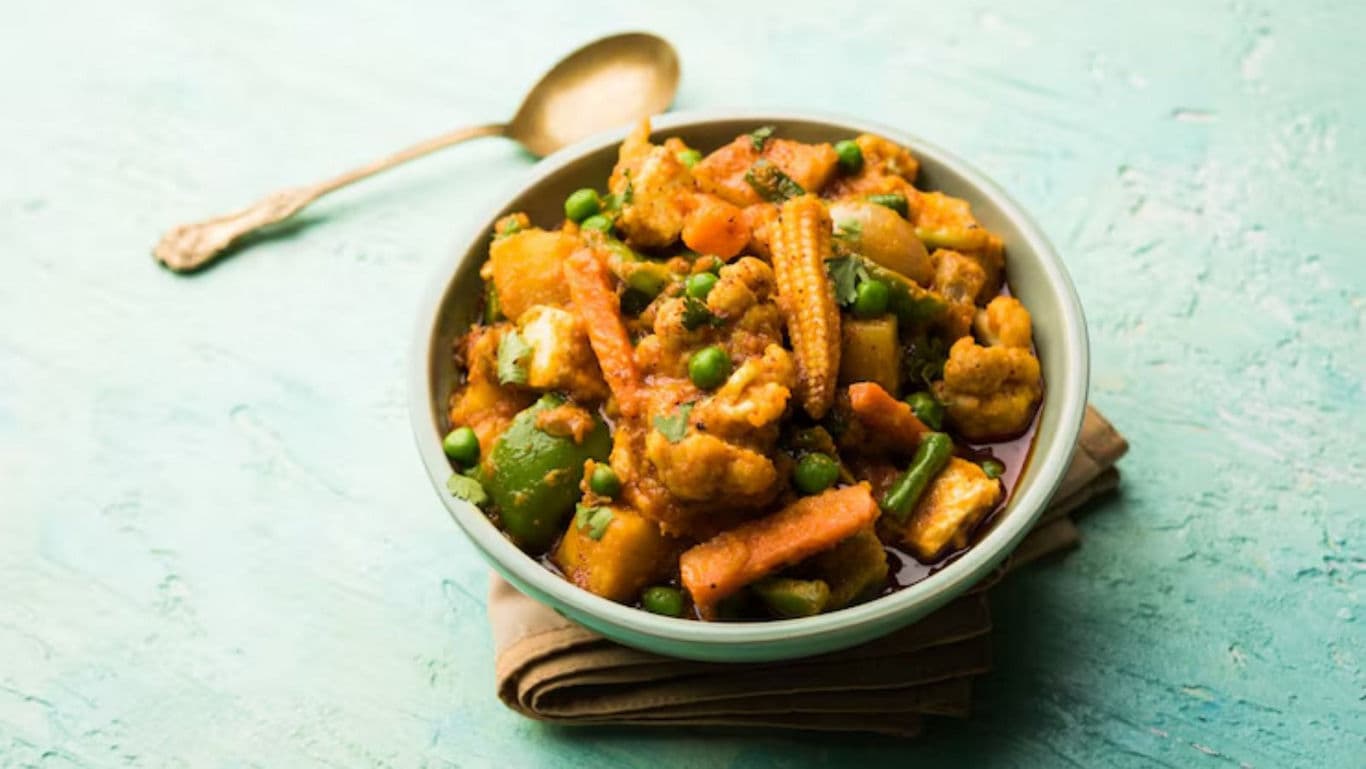 Bowl of Mixed Vegetable Curry on Table