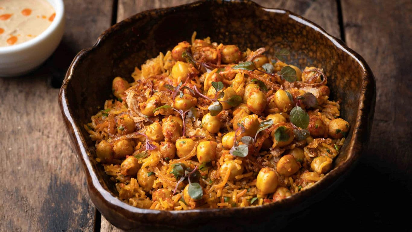 Spiced chickpea rice in rustic bowl