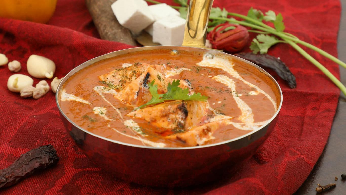 Creamy Indian curry with paneer cubes