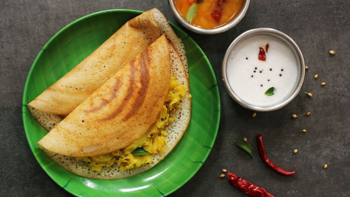 Traditional Indian dosa with chutneys