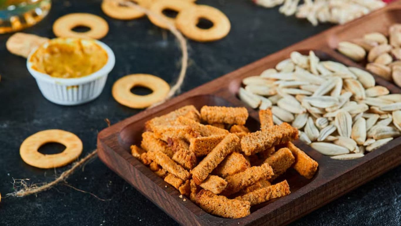 Assorted snacks on wooden platter
