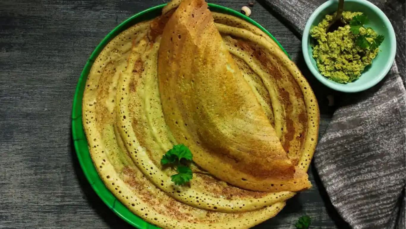 Crispy Indian Dosa Served with Green Chutney