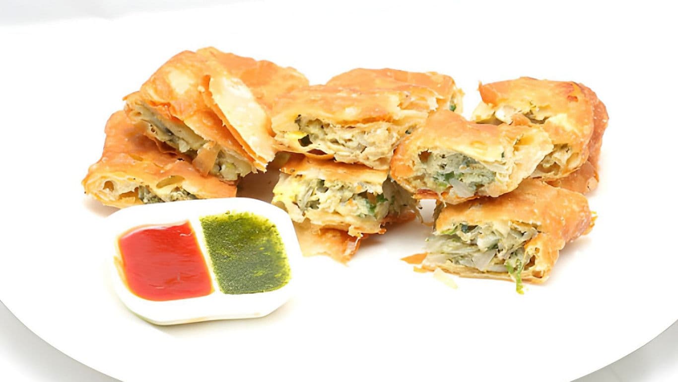 Crispy stuffed pastry with dipping sauces