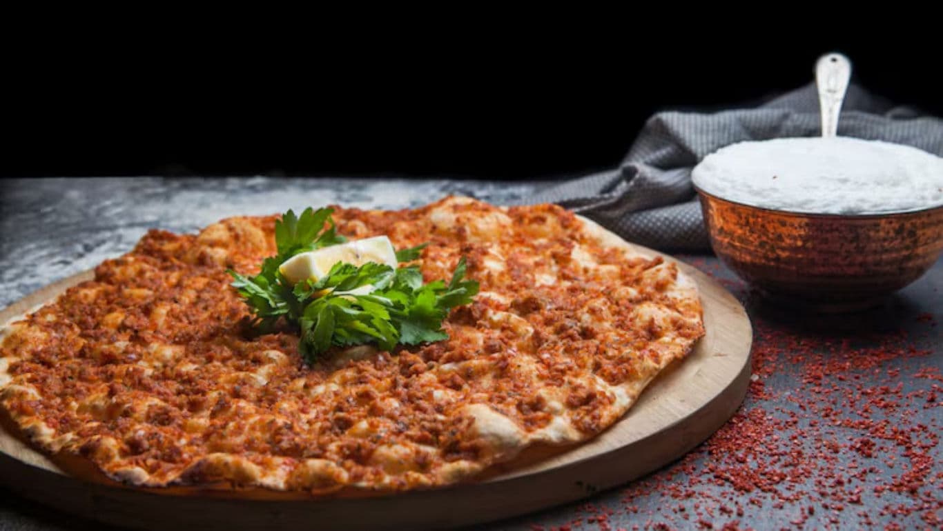Thin-crust pizza with herbs and spices
