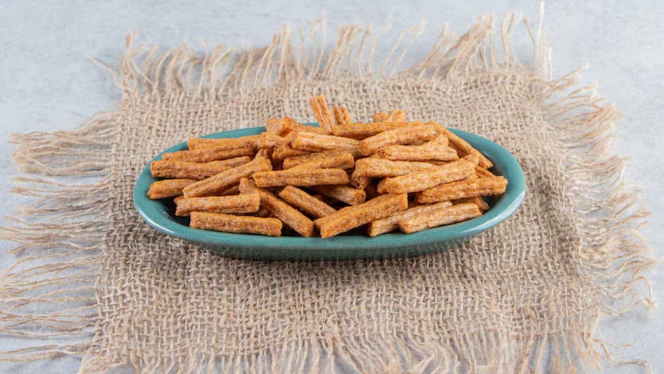 Crispy snack sticks on rustic burlap