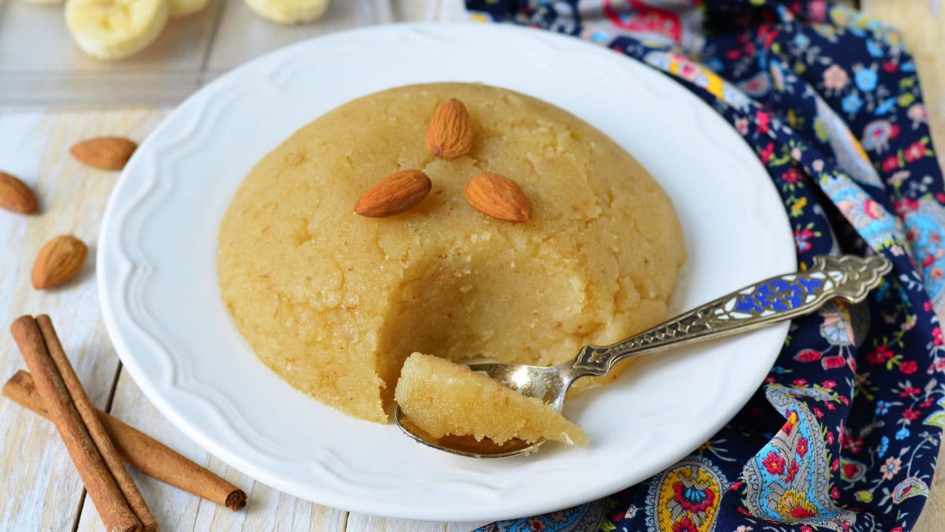halwa, poori, chana dishes arranged for puja.