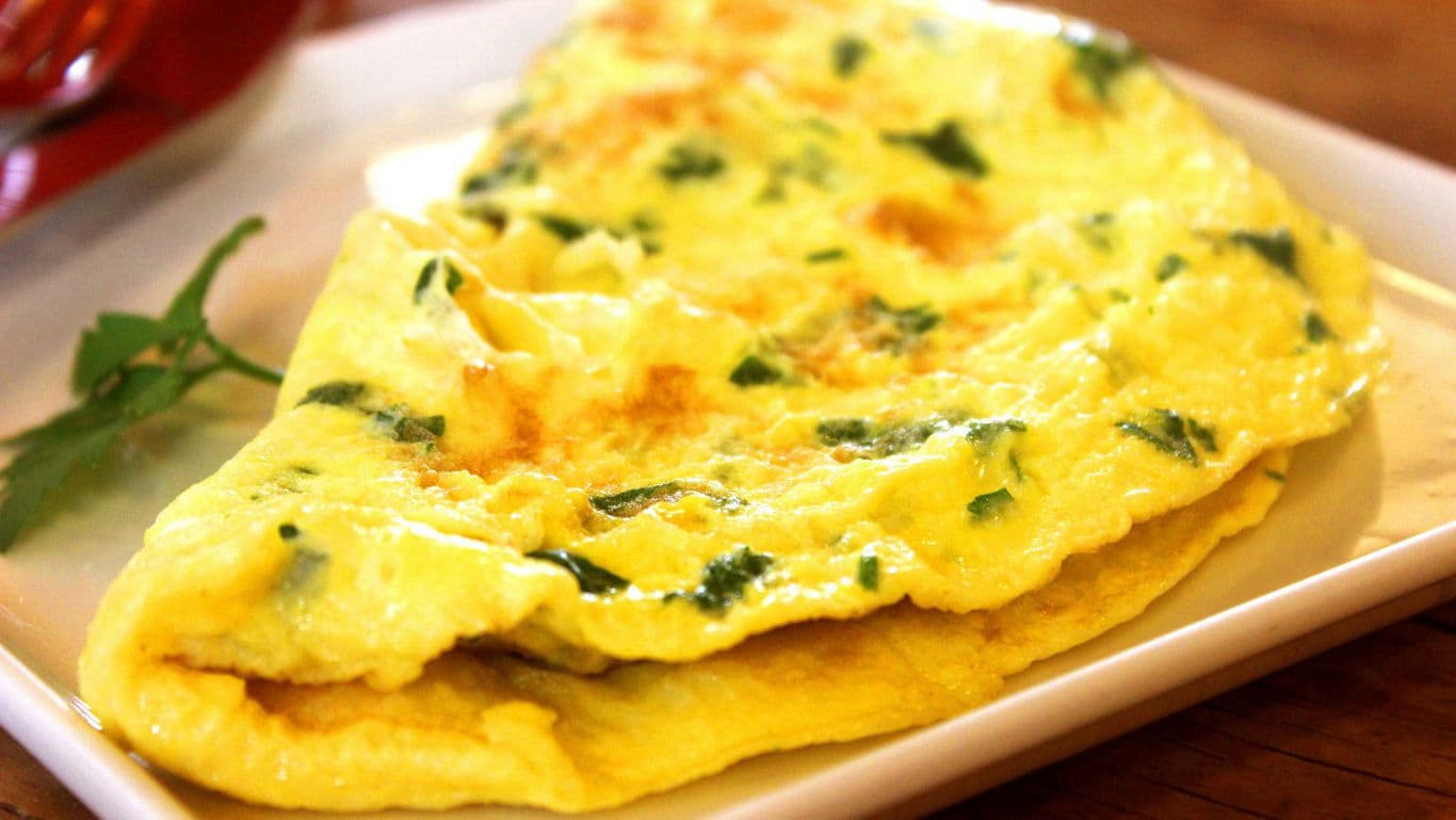 Golden omelette with fresh herbs
