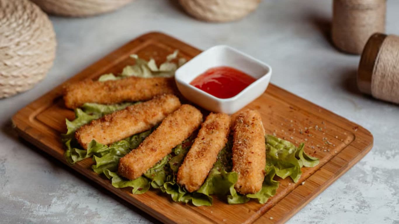 Crispy breaded sticks with dipping sauce
