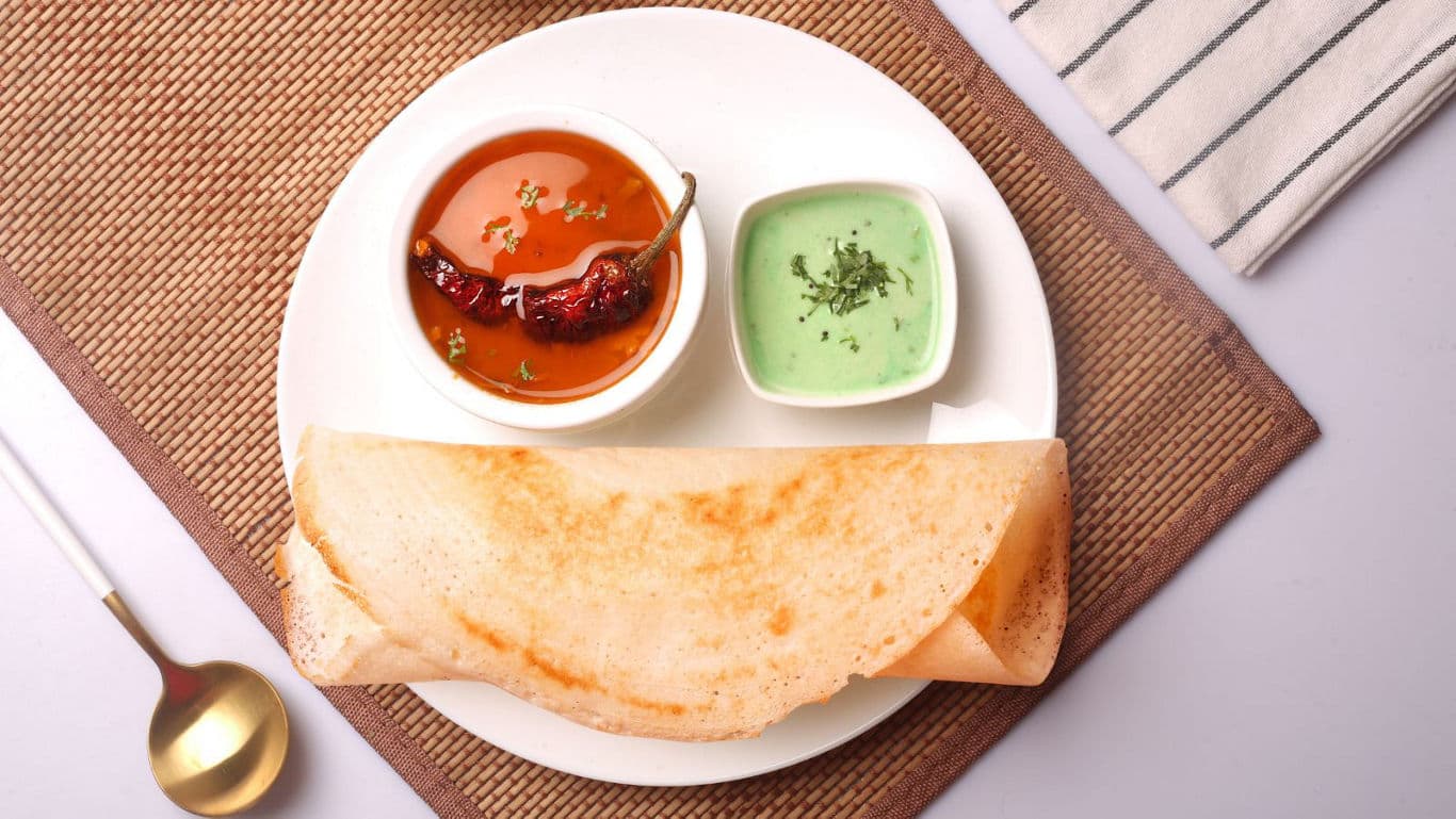 South Indian dosa with chutneys and curry