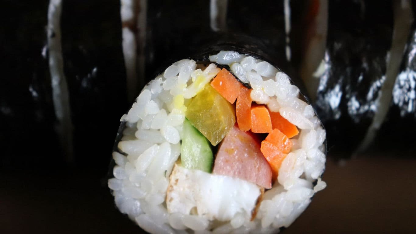 Close-up of assorted vegetable sushi roll