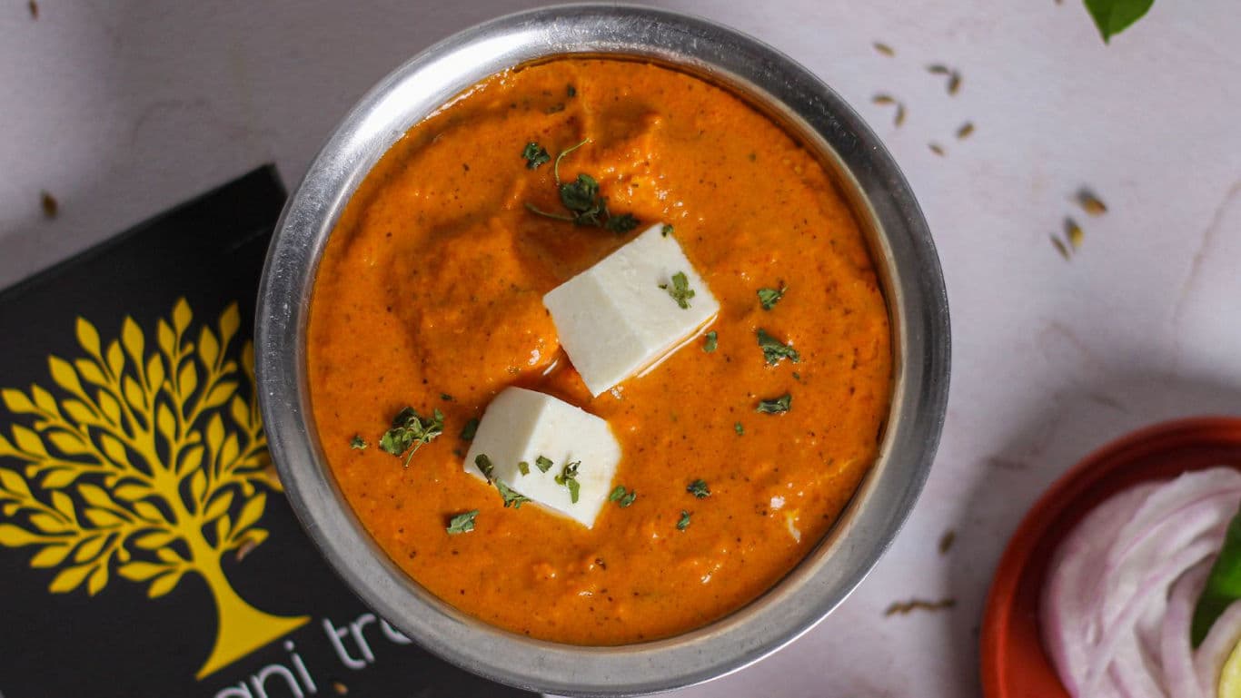 Creamy paneer curry with garnish