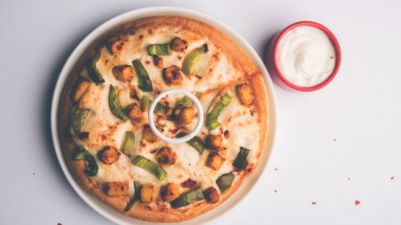 Vegetarian pizza with paneer and peppers