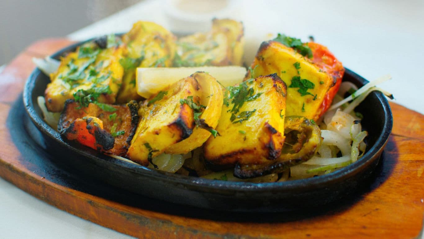 Grilled paneer on sizzling platter