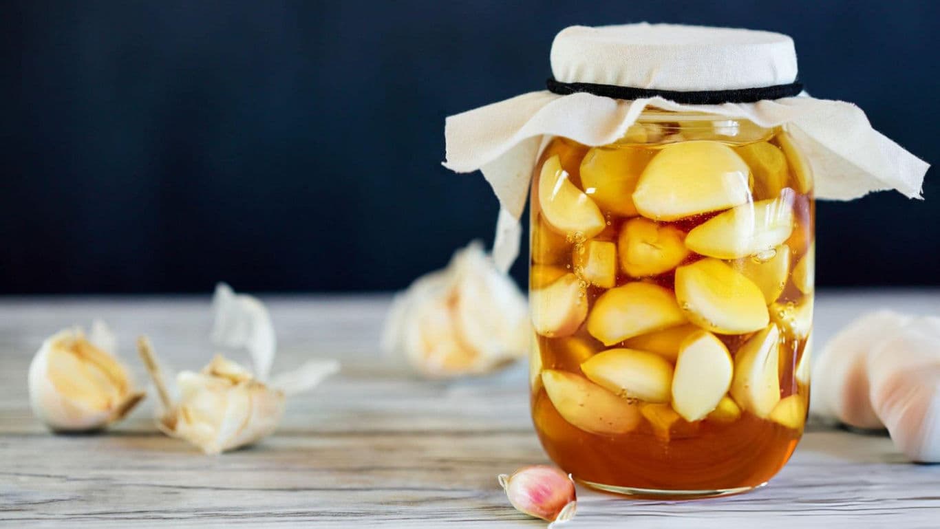 Fermented or pickled garlic in a jar