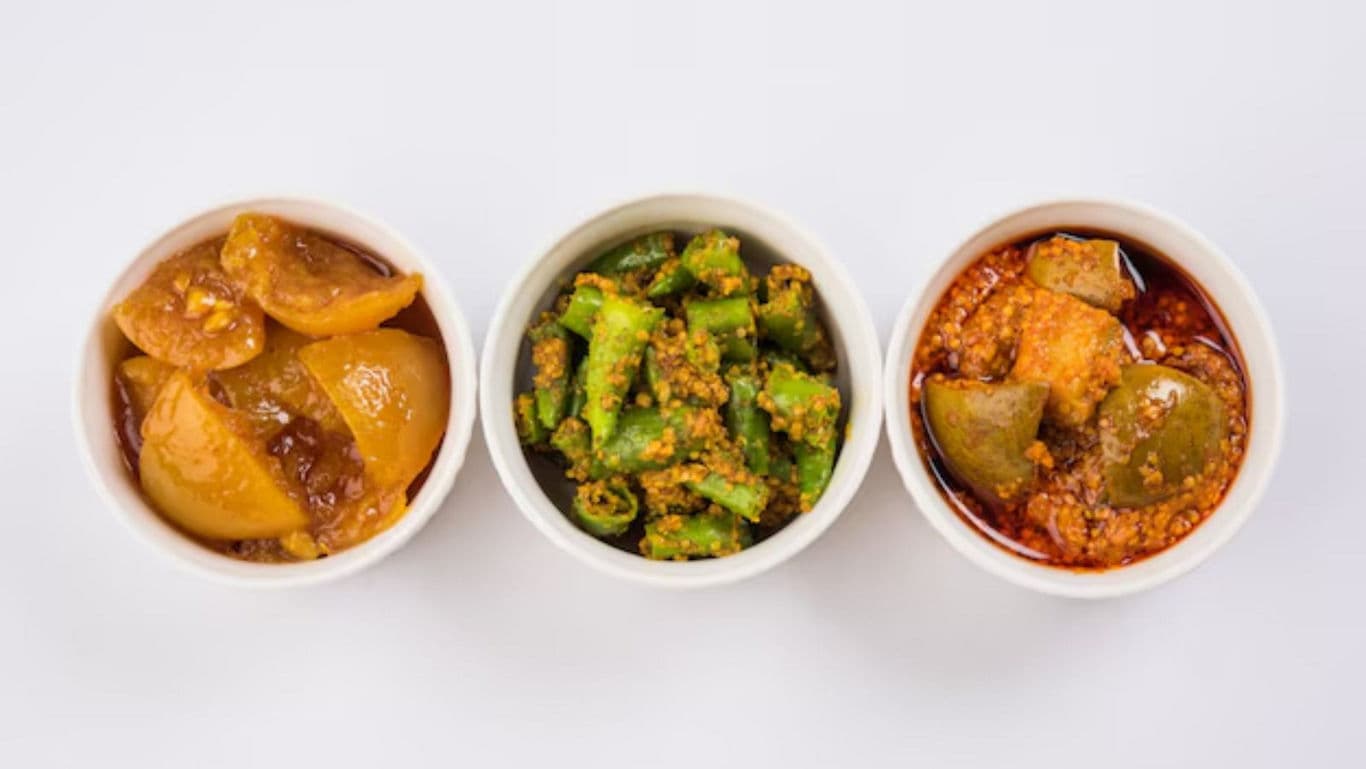 Assorted Indian Pickles in White Bowls Overhead