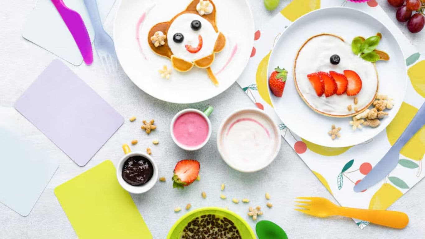 Colorful breakfast with playful pancake designs
