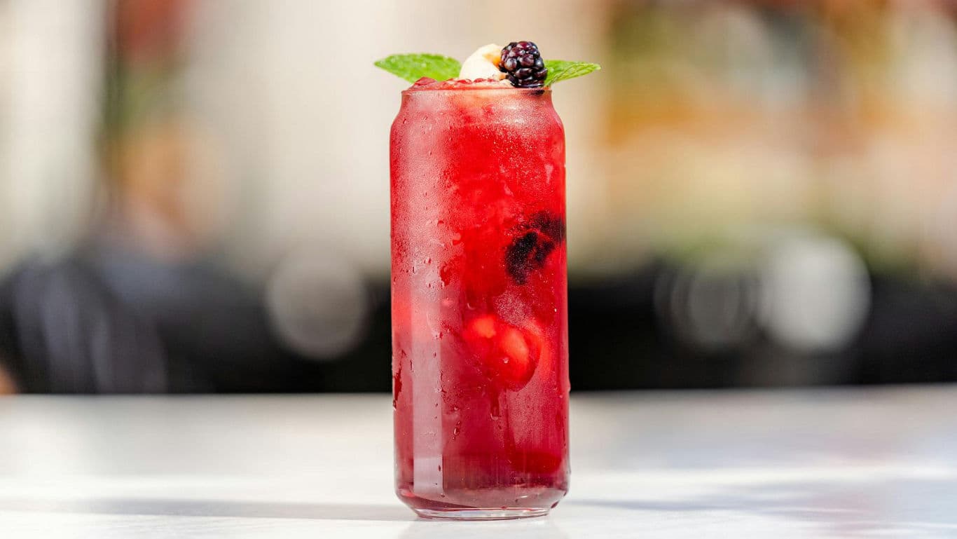 Refreshing berry drink in tall glass