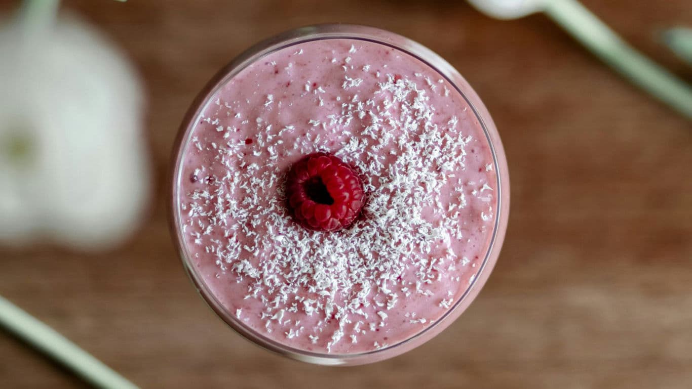 Raspberry smoothie with coconut topping