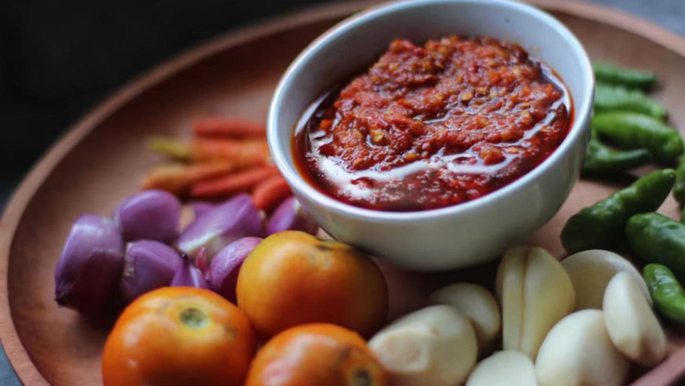 Bowl of Spicy Red Sauce with Vegetables