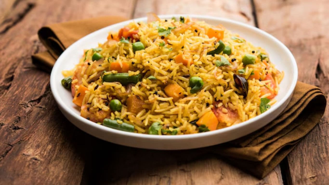Vegetable Pulao on Wooden Table
