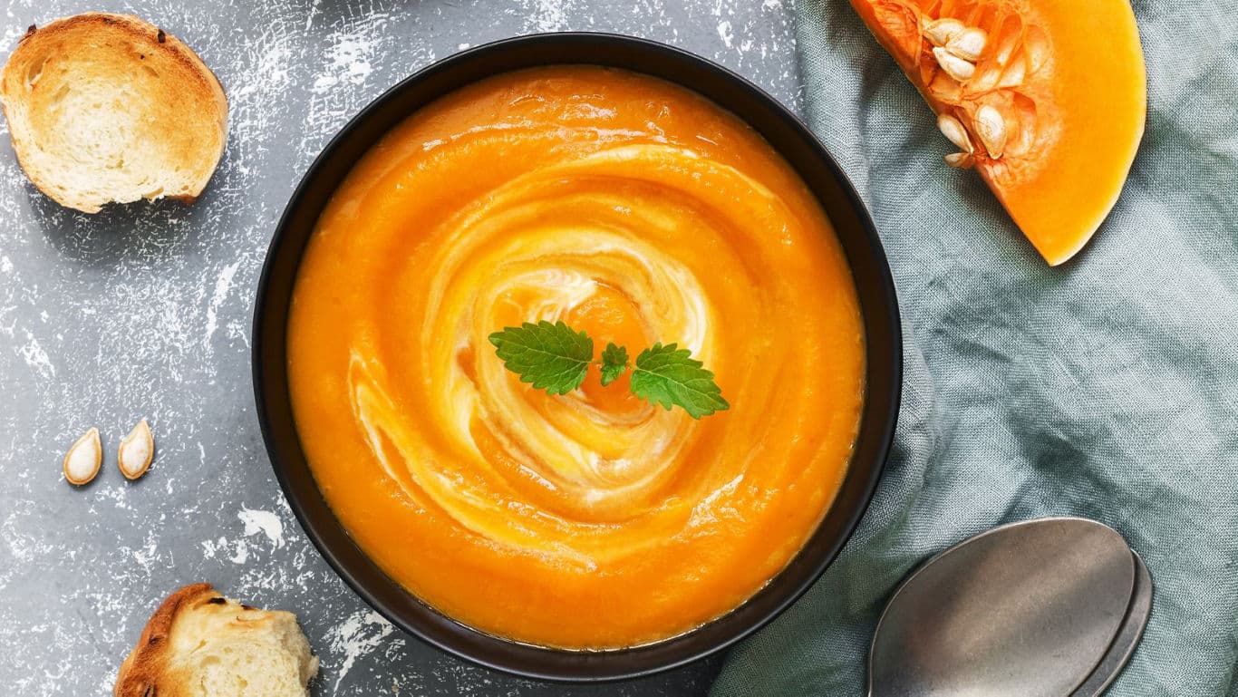 Pumpkin soup with fresh garnish