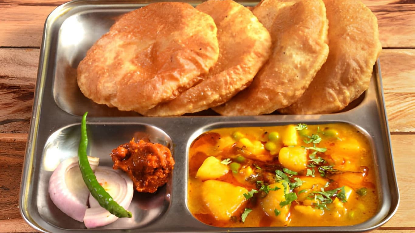 Indian meal with puri and curry
