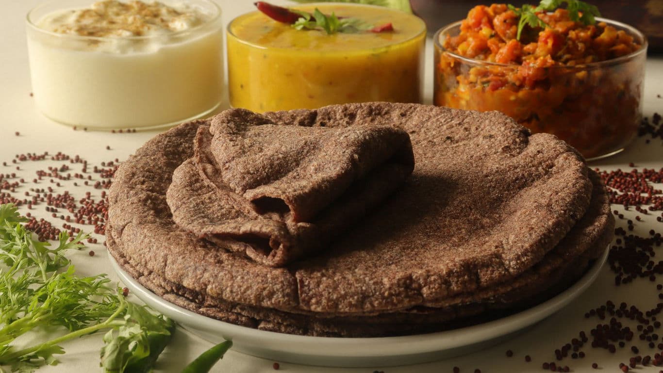 Traditional millet flatbread with Indian sides