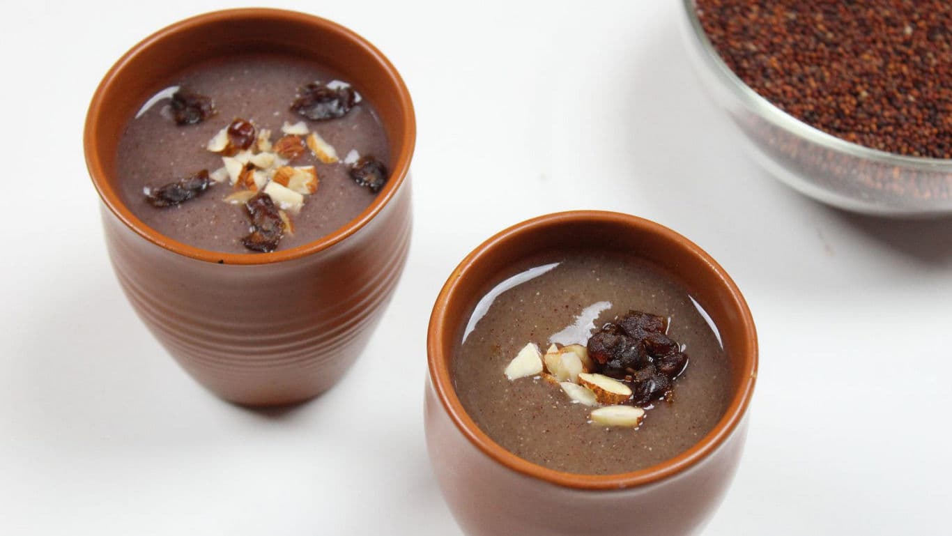 Two bowls of ragi porridge with nuts