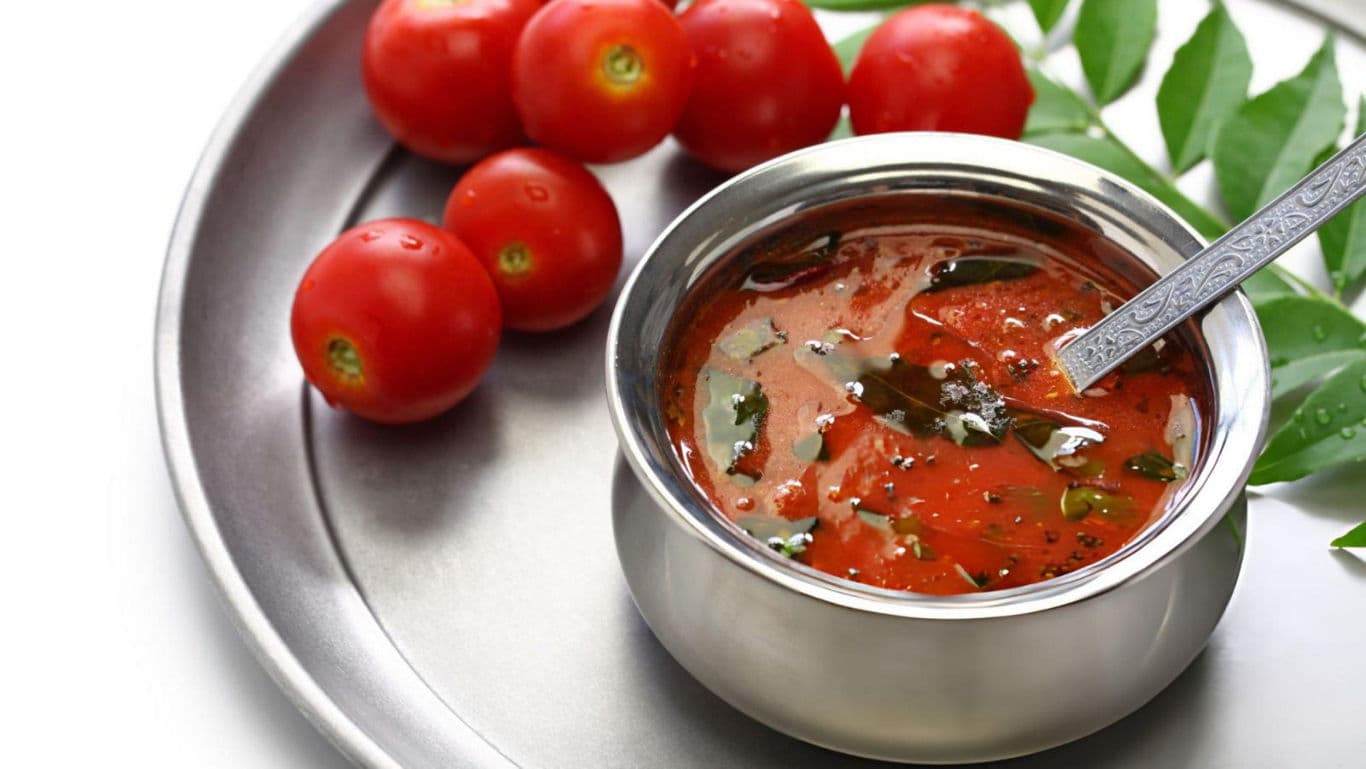 Tomato soup in stainless steel bowl