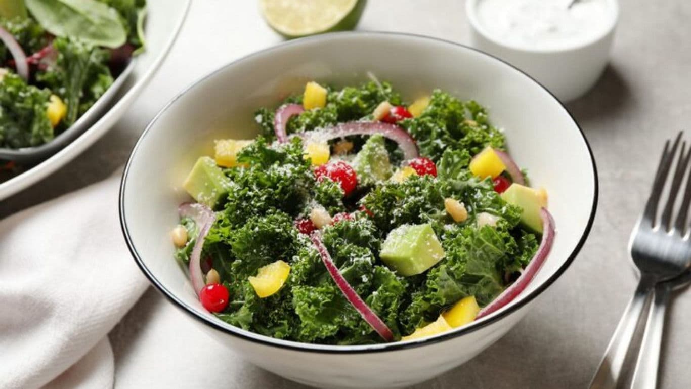 Fresh kale salad with avocado and vegetables
