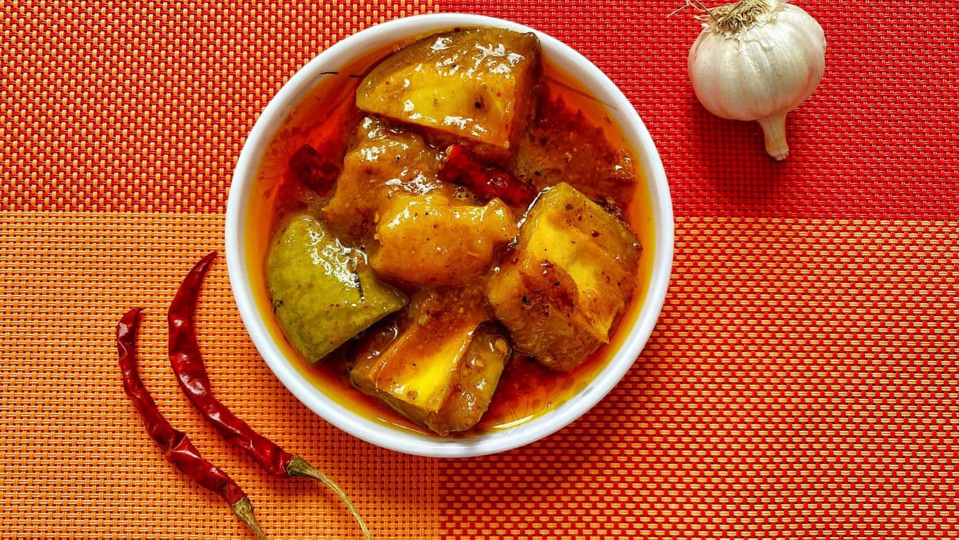 Spicy Indian Mango Pickle in White Bowl