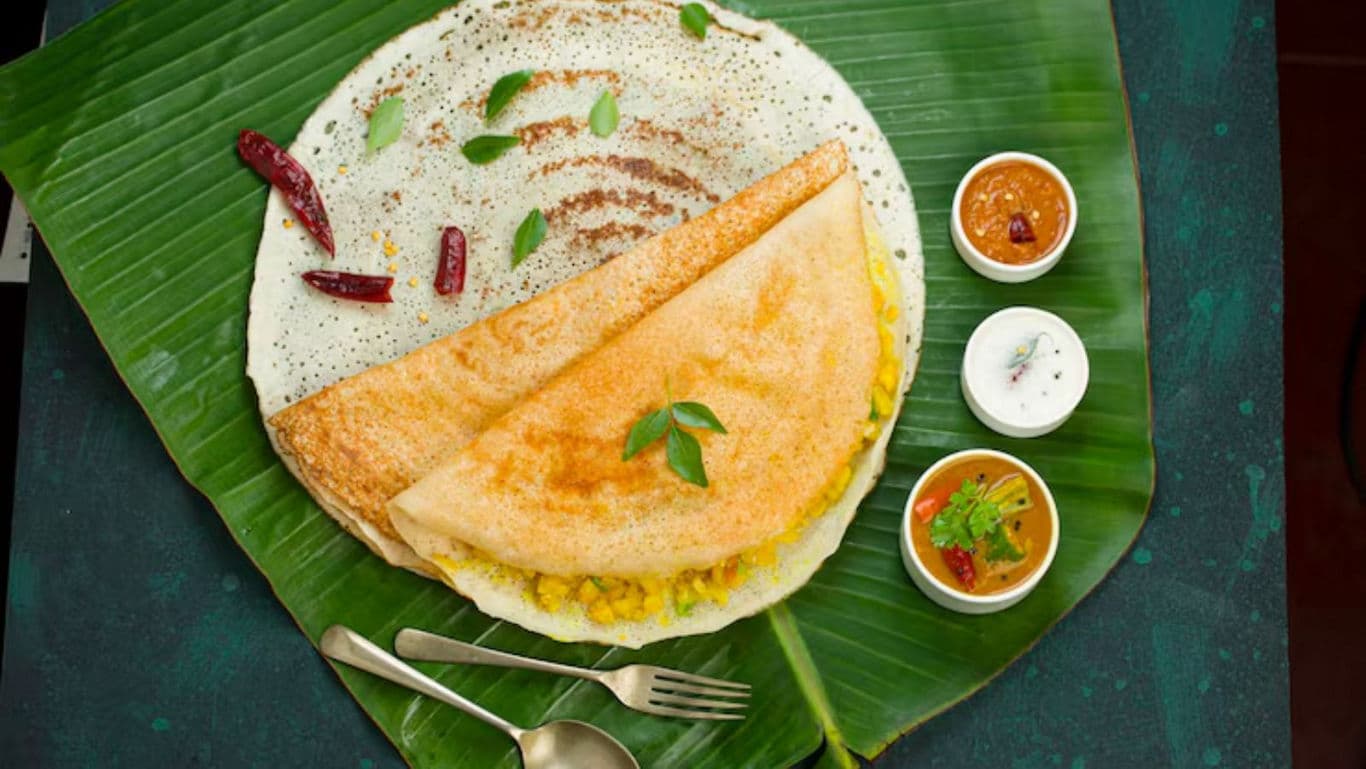 Traditional Indian dosa with chutneys