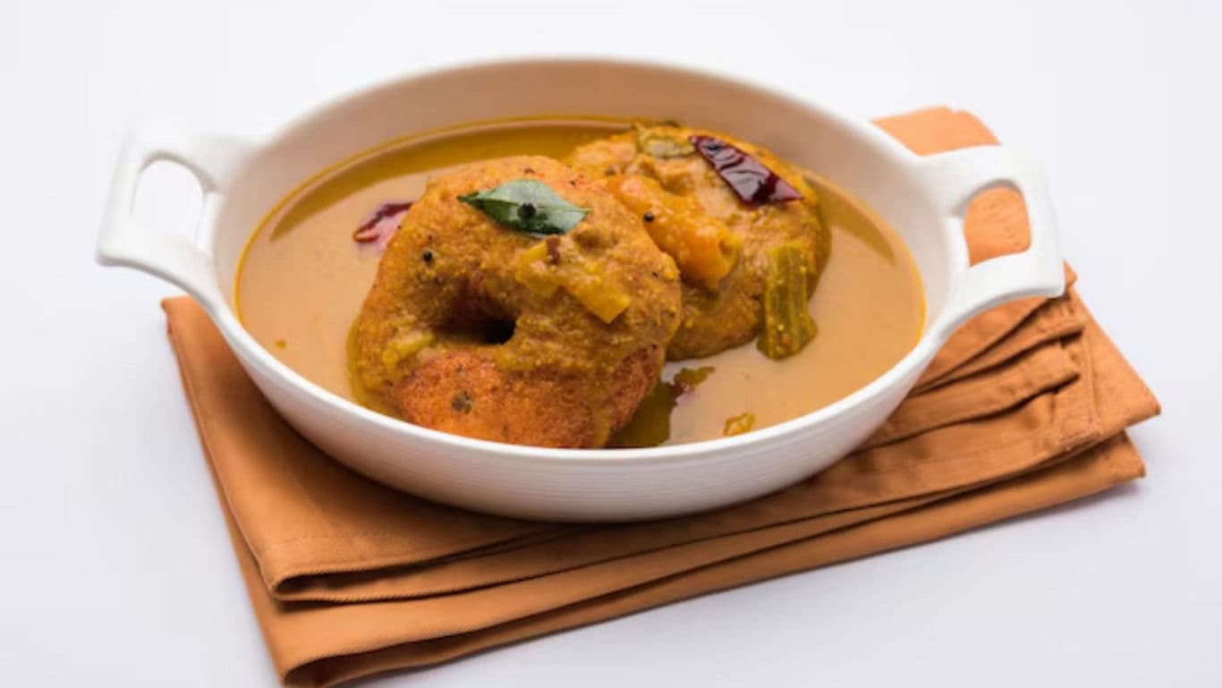 South Indian vada in curry sauce