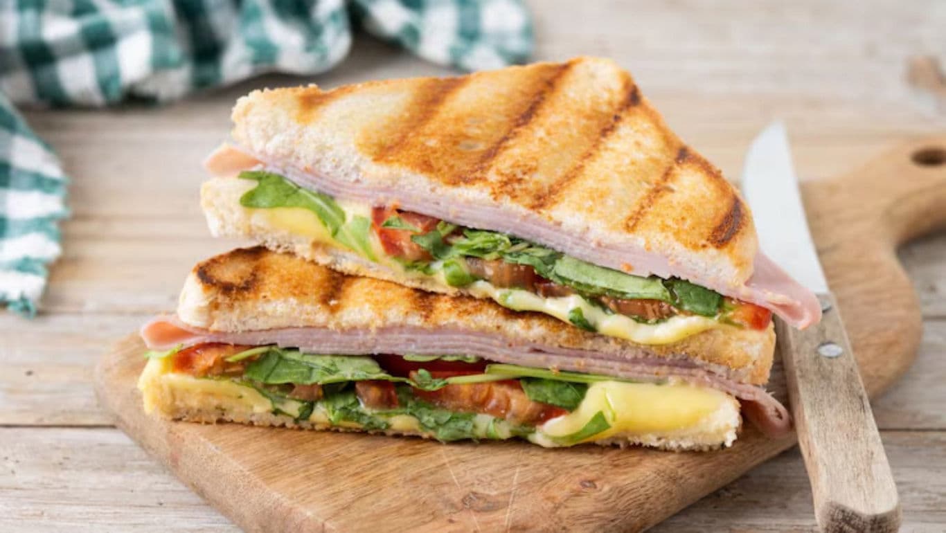 Grilled Ham and Cheese Sandwich with Fresh Greens