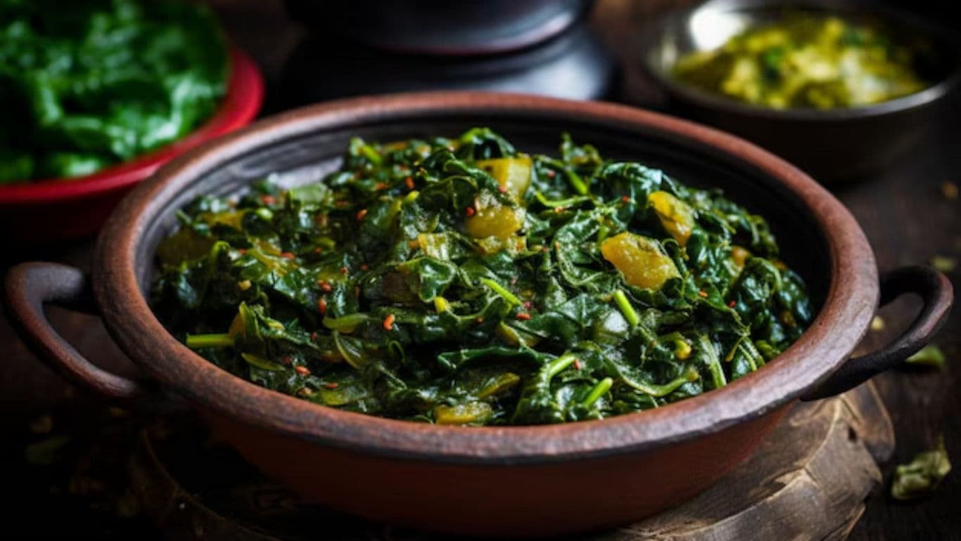 Rustic spinach dish in clay pot