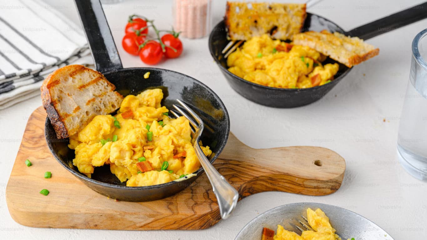 Boiled, scrambled and poached eggs for breakfast