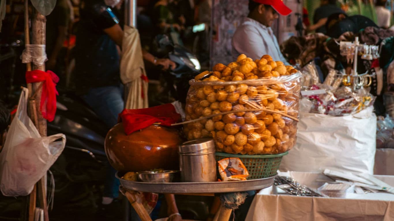 Street food stall with fried snacks