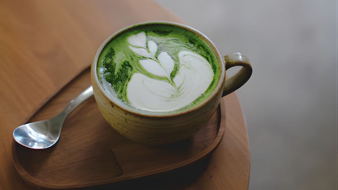 Matcha coffee on a table - banner image