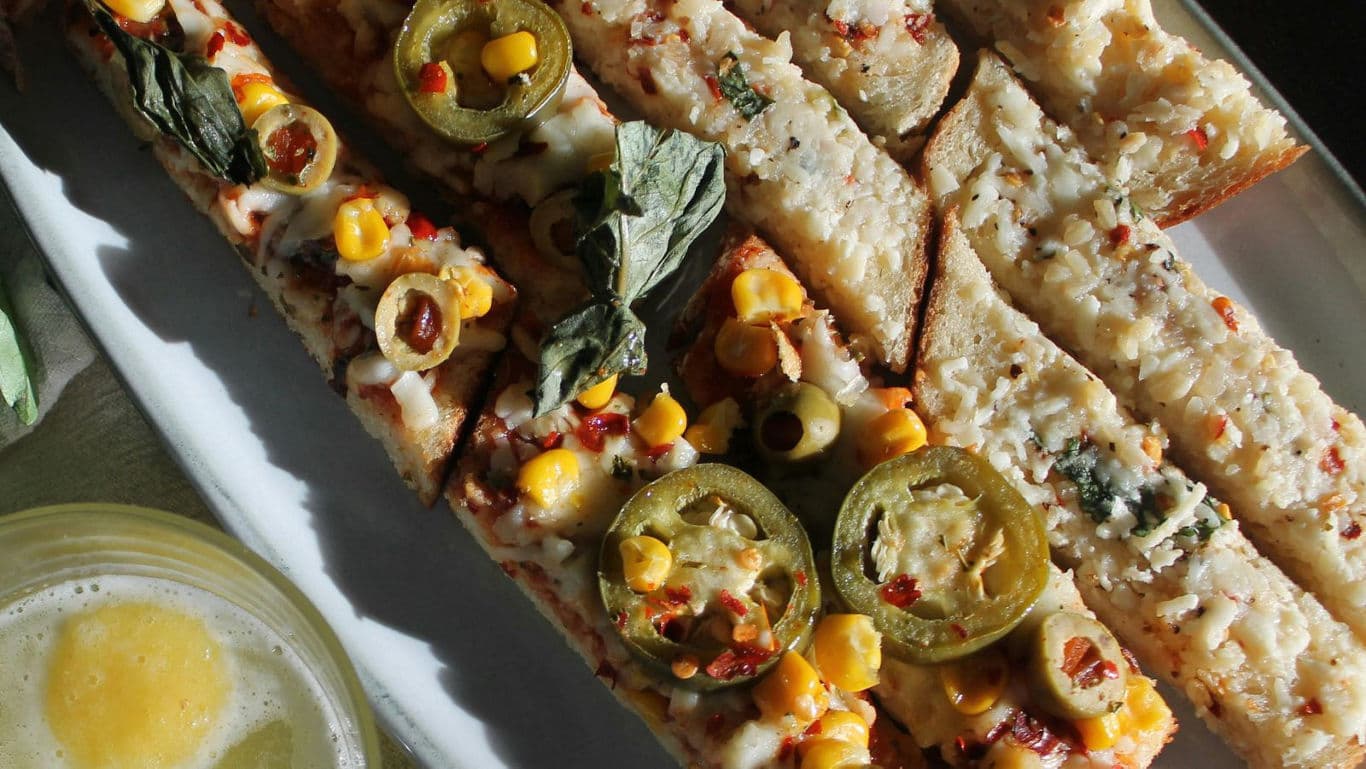 Cheesy breadsticks with jalapeños and corn