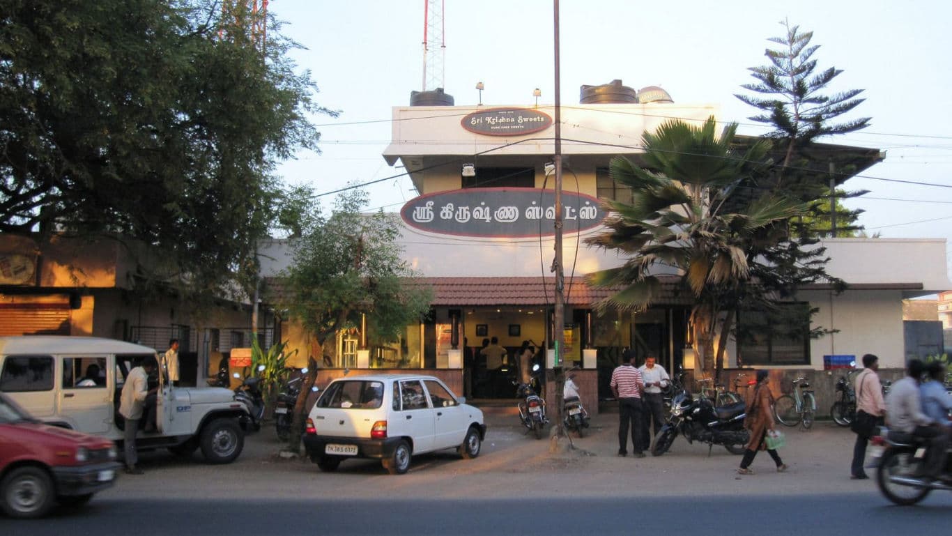 Busy South Indian Restaurant Exterior at Sunset