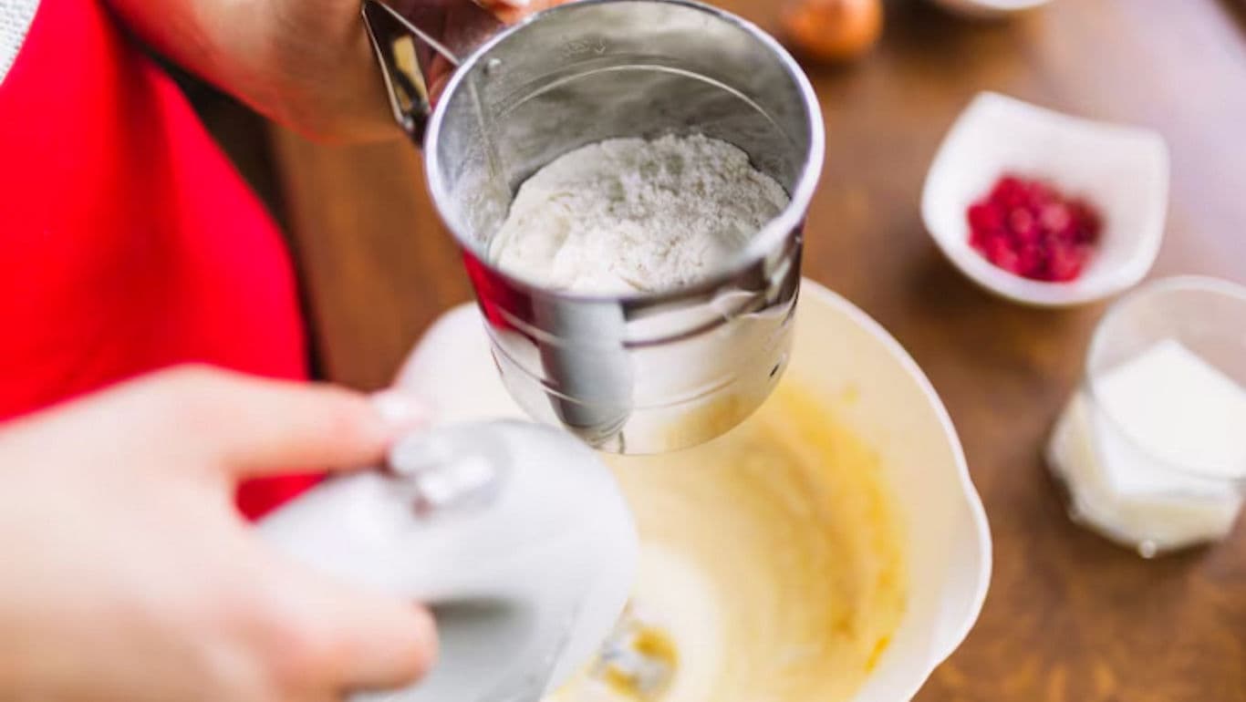 Baking preparation with flour sifter