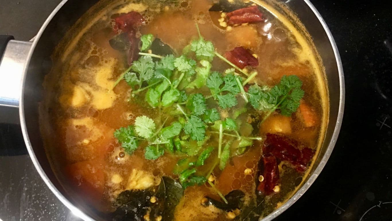 Spicy soup with herbs and vegetables