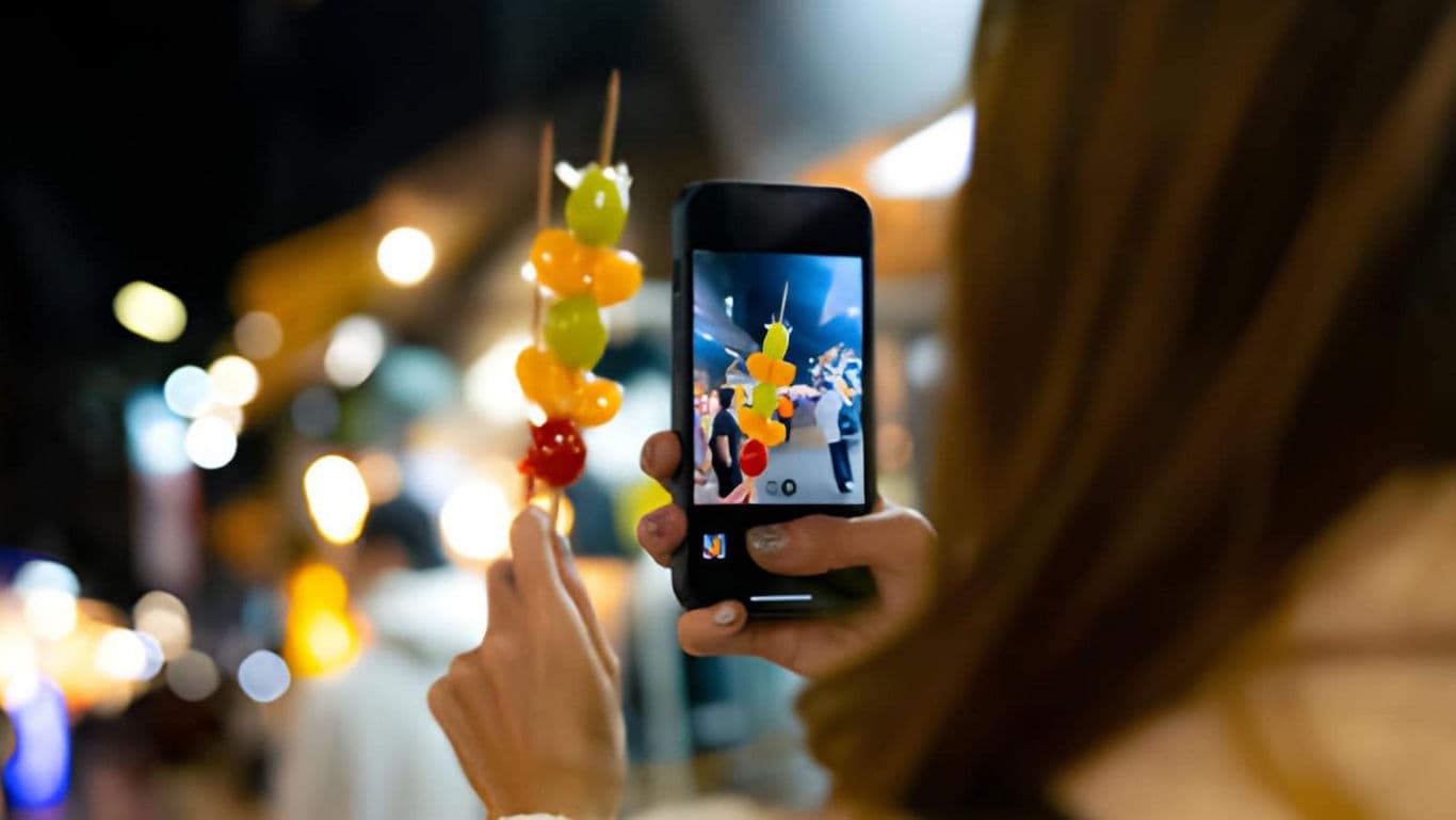 Night market skewer captured on smartphone