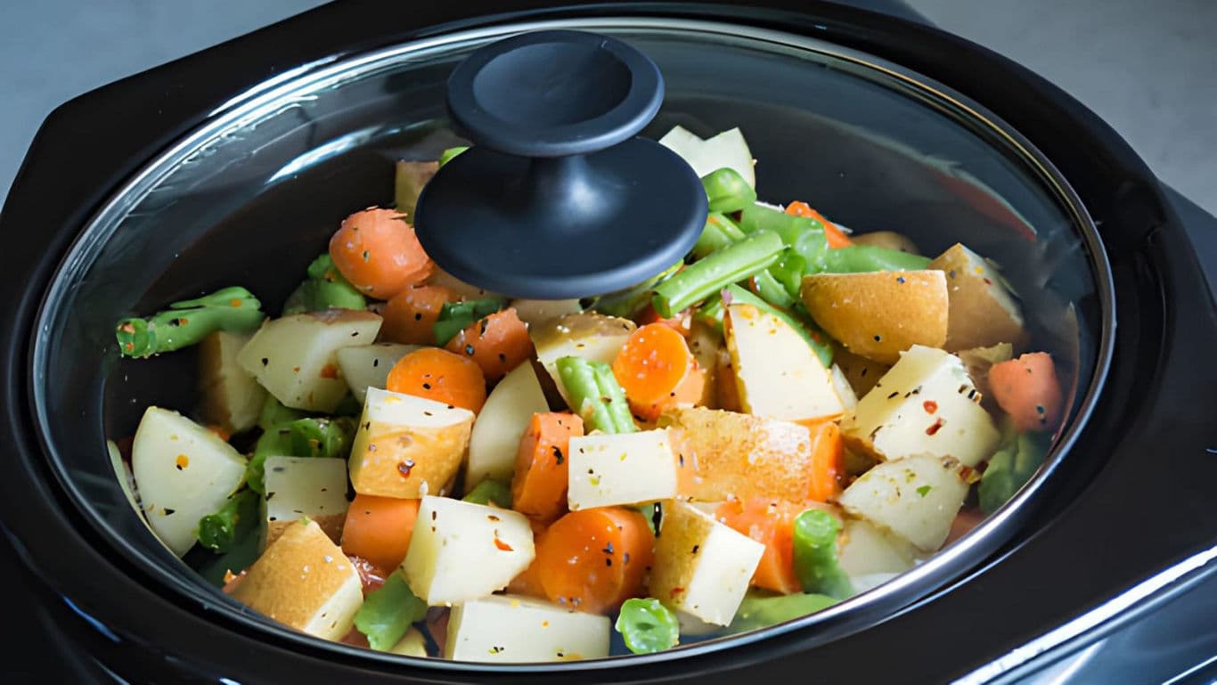 Fresh Vegetables Cooking in Electric Slow Cooker