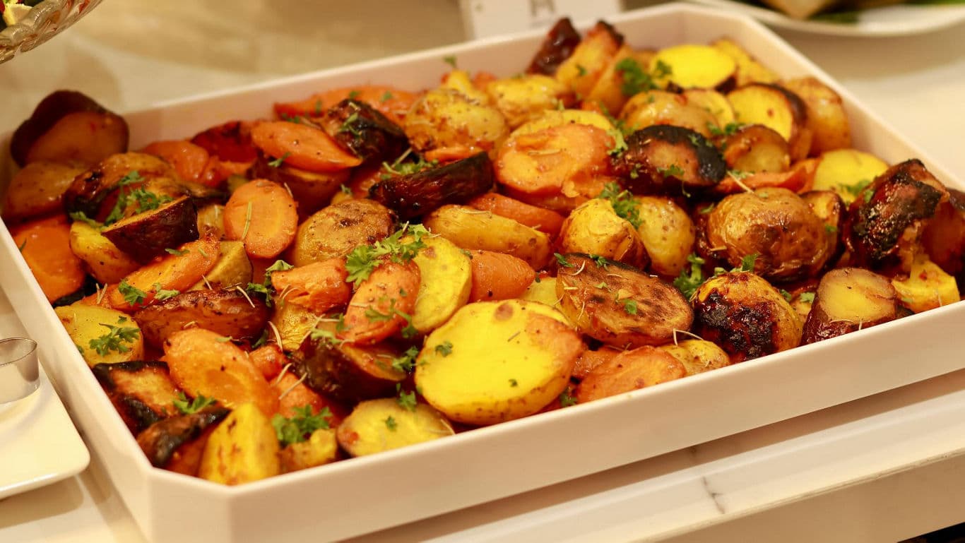 Oven Roasted Root Vegetables in White Serving Tray