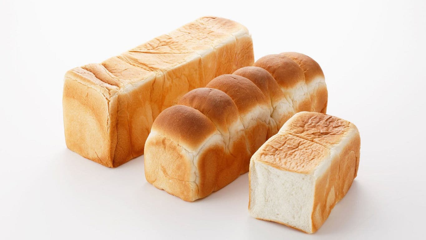 Three Loaves of Fresh White Bread