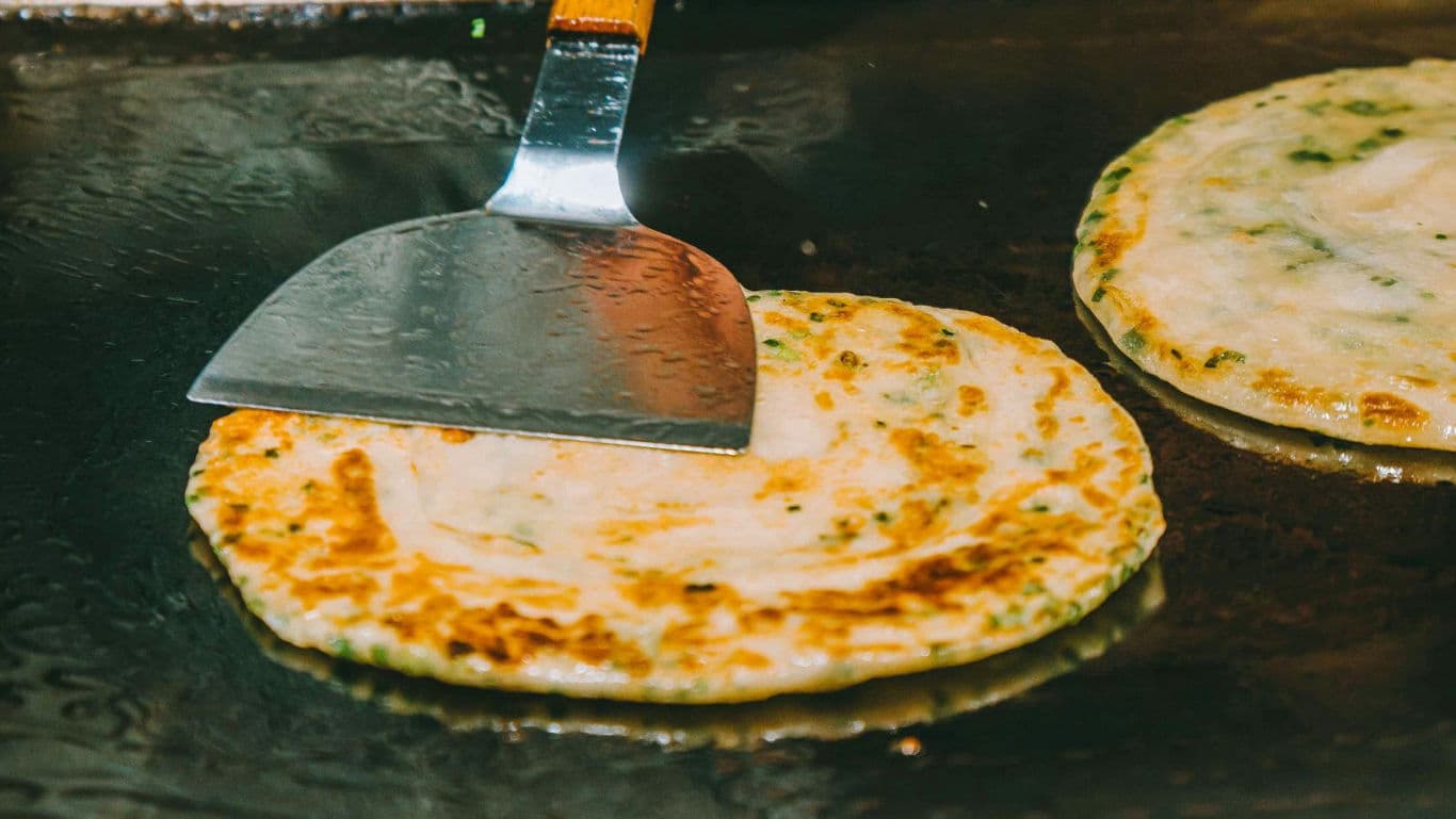 Cooking flatbread on a hot griddle