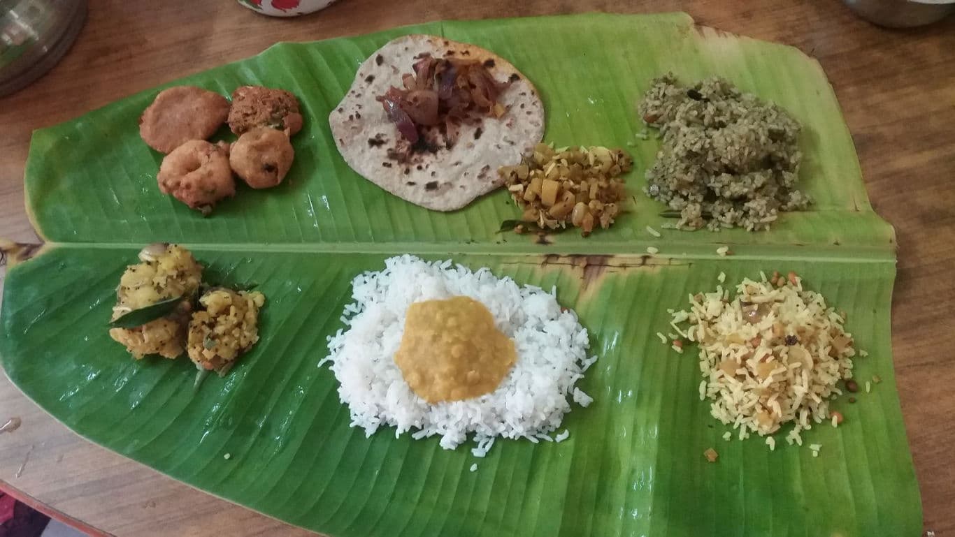 Traditional Indian meal served on banana leaf