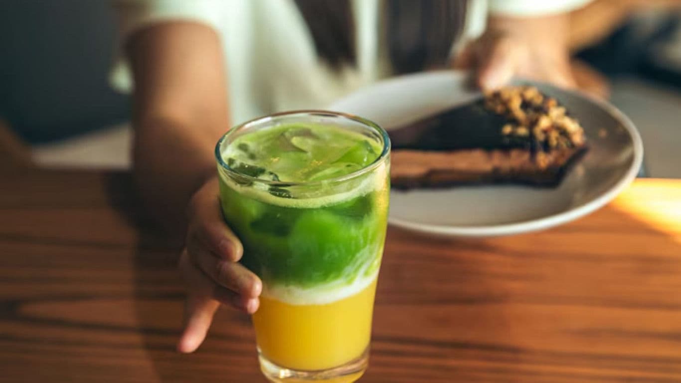 Refreshing drink with dessert in cafe