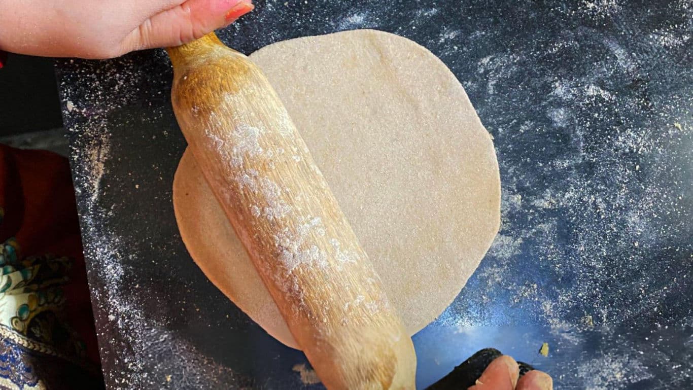 Rolling dough on a floured surface